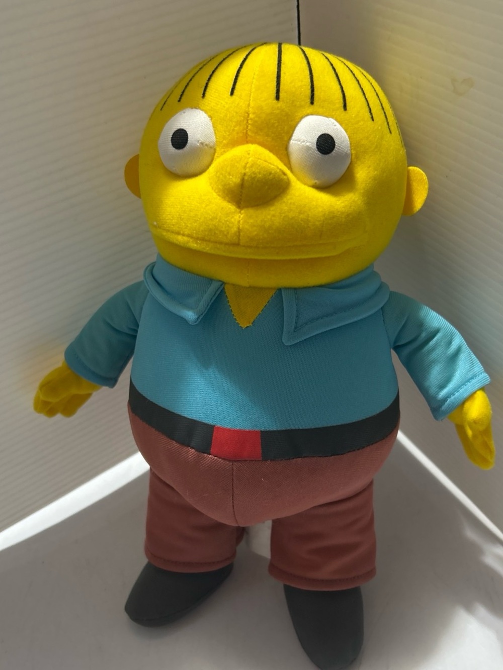 Kids Yellow Plush Character Toy with Blue Shirt and Brown Pants